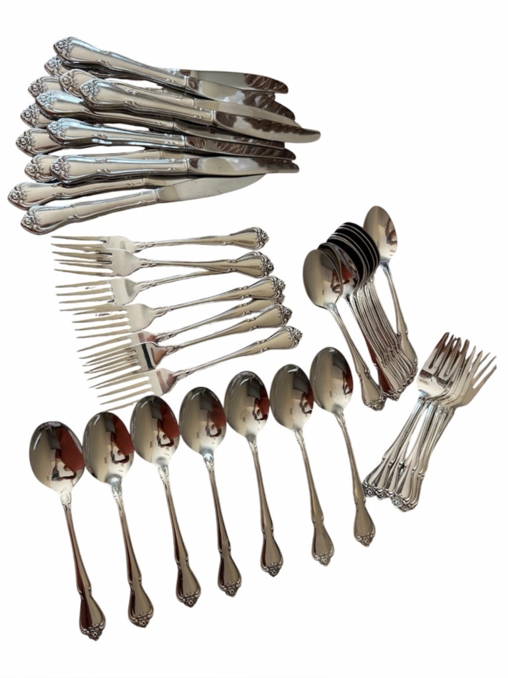 A lot of Vintage Oneida flatware,  stainless steel and silver-plated cutlery.